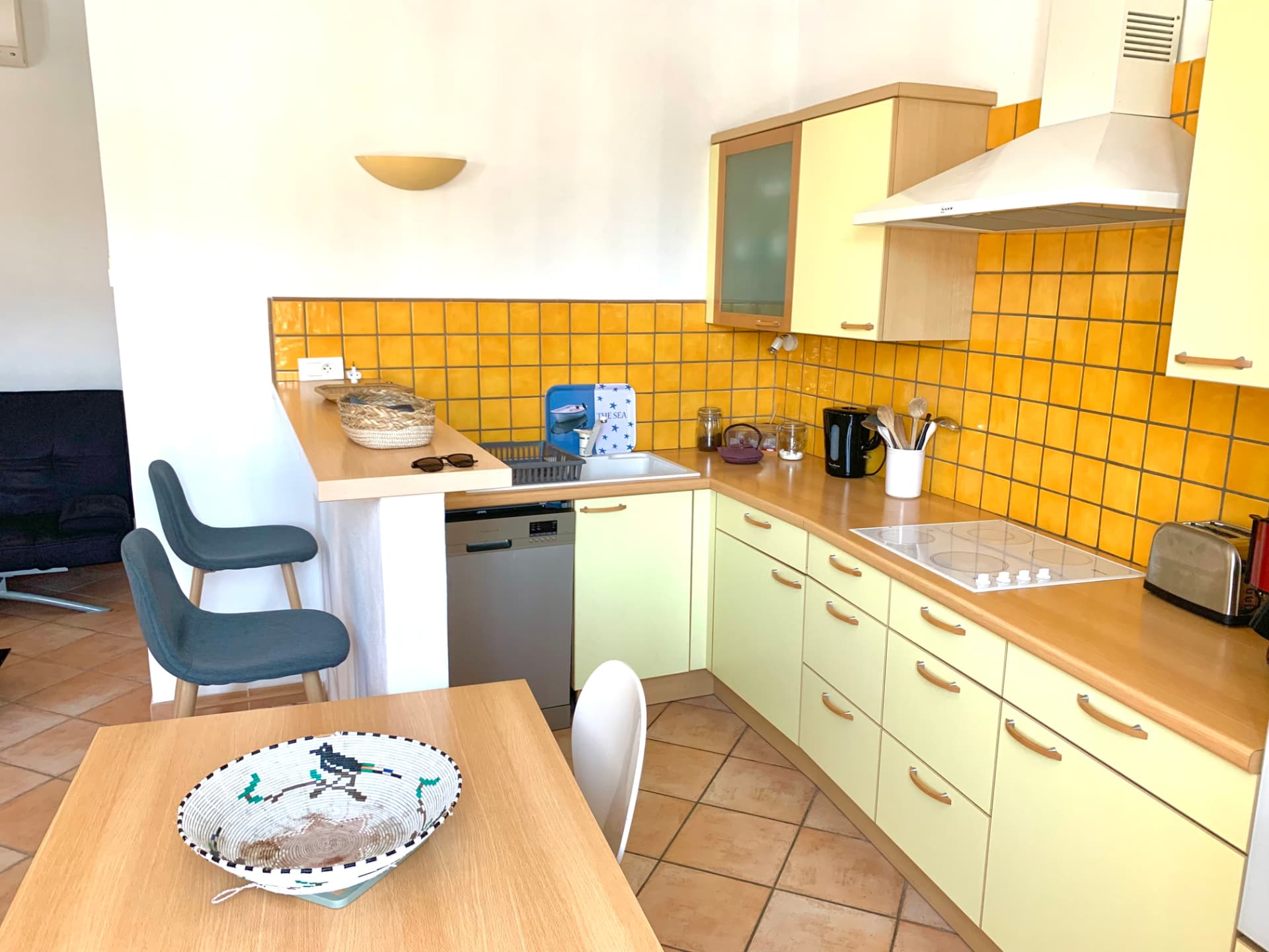 Cuisine de Piana avec plan de travail en bois clair